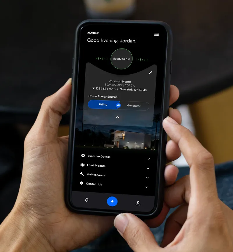 A person checking their home's power status on the Kohler app on their phone